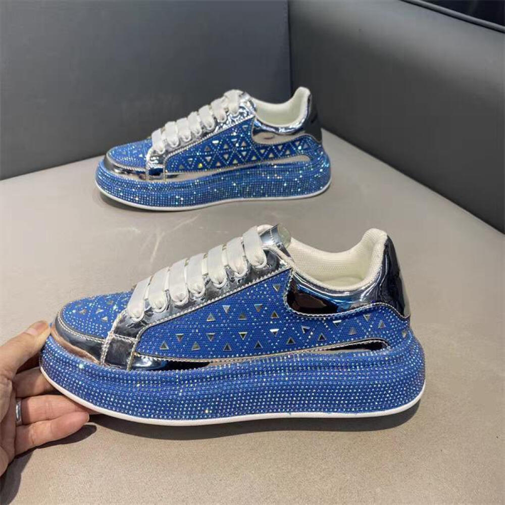 Luxury sneakers adorned with triangular rhinestones