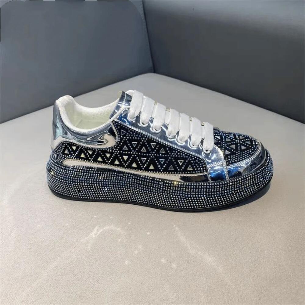 Luxury sneakers adorned with triangular rhinestones