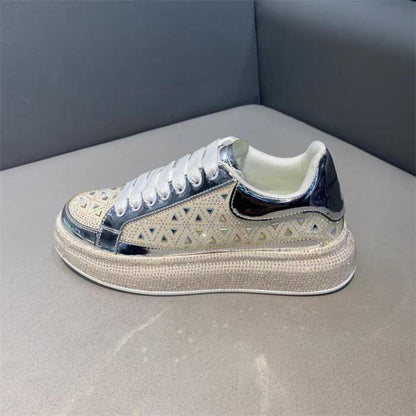 Luxury sneakers adorned with triangular rhinestones