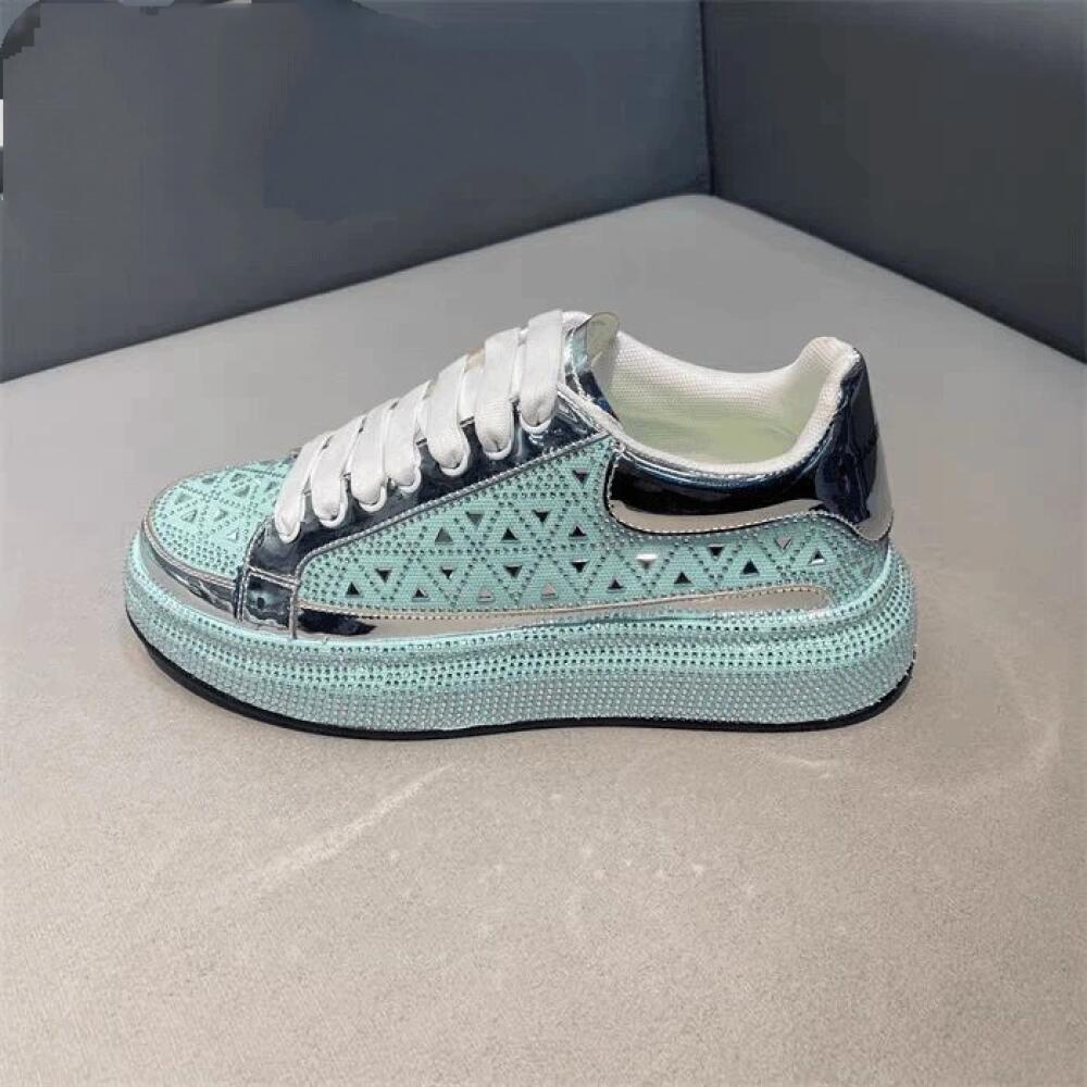 Luxury sneakers adorned with triangular rhinestones