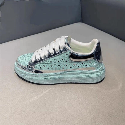 Luxury sneakers adorned with triangular rhinestones