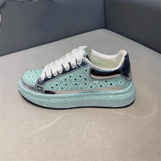 Luxury sneakers adorned with triangular rhinestones