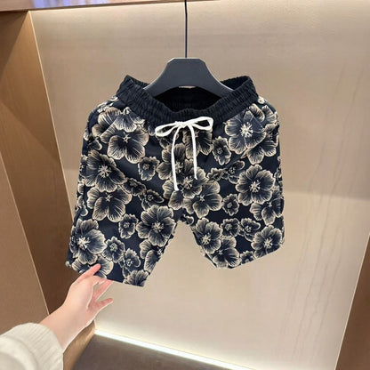 Plaid Subtle Embossed T‑Shirt & Golden Floral Shorts